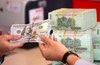 VND tiếp tục chịu áp lực trong tháng 8, lo ngại tình trạng găm giữ USD