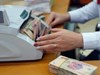 Lãi suất nhích lên, dòng tiền vào ngân hàng lập kỷ lục