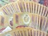 Tiền giả 100.000 đồng và 200.000 đồng xuất hiện với thủ đoạn tinh vi, người dân cần đặc biệt lưu ý