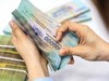 Tín dụng tăng mạnh nhất 15 năm, ngân hàng bơm thêm gần 2,1 triệu tỷ đồng ra nền kinh tế