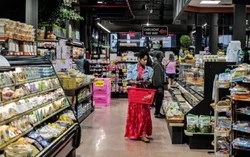 Kinh tế Mỹ tăng trưởng vượt kỳ vọng, thị trường nâng dự báo Fed tăng lãi suất